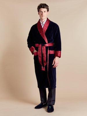 Mayfair Long Velvet Navy Smoking Jacket with Burgundy Piping - model photo front | Bown of London